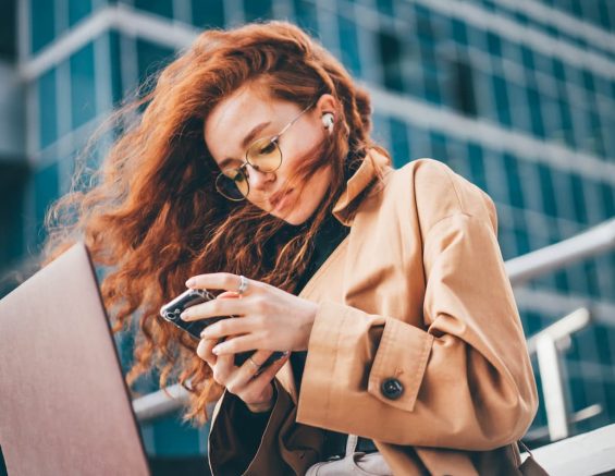 a women working and answering a text